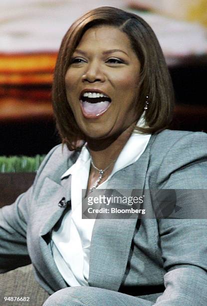 Recording artist Queen Latifah laughs during the Microsoft Digital Entertainment Anywhere Launch Event of the Microsoft Windows XP Media Center...