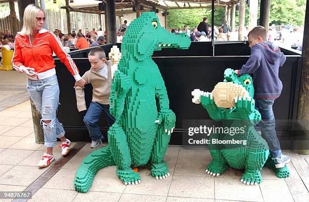 Tammy Smithv plays with Aarron Smith, left, and Brooke Waithe at Legoland in Windsor, Berkshire, UK, Sunday, May 29, 2005.