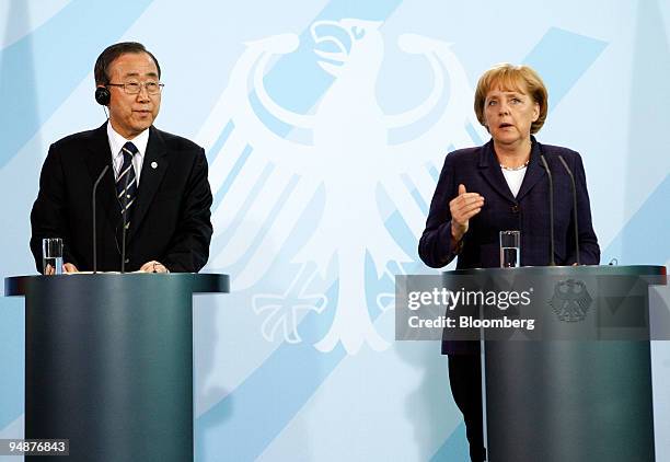 Angela Merkel, Germany's chancellor, right, speaks at a news conference with Ban Ki-Moon, the United Nations' secretary-general, at the federal...