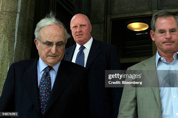 Dennis Kozlowski, center, former CEO of Tyco International, leaves Manhattan Supreme Court for lunch with his lawyer Stephen Kaufman, left, and an...