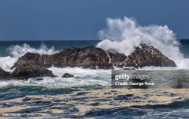 Large ocean waves crash on the shoreline rocks near Spanish Bay, located along the famed 17-Mile Drive, on April 10 in Monterey, California. An...