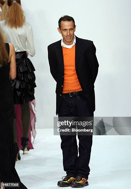 Ben de Lisi, fashion designer, acknowledges applause following his autumn/winter 2008 fashion show in London, U.K., on Sunday, Feb. 10, 2008. Over...