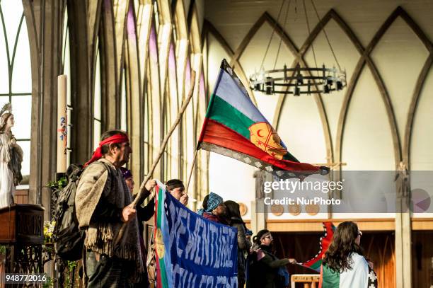 Mapuche Huilliche communities enter the Osorno Cathedral in Osorno, Chile on 19 April 2018, in solidarity with Machi Celestino Cordova who has been...