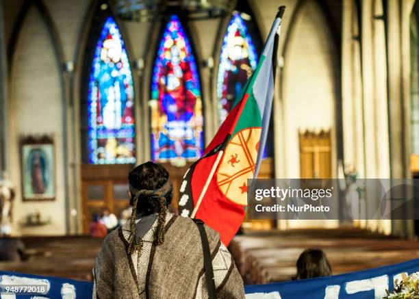 Mapuche Huilliche communities enter the Osorno Cathedral in Osorno, Chile on 19 April 2018, in solidarity with Machi Celestino Cordova who has been...