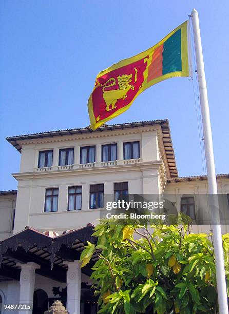 The Sri Lankan national flag flies above the colonial-era Galle Face Hotel in Colombo, Sri Lanka Thursday, March 4, 2004.