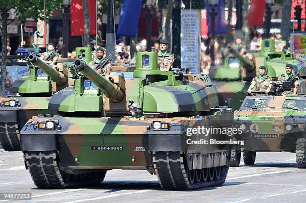 Members of the armed forces parade during the Bastille Day celebrations on the Champs Elysees in Paris, France, on Monday, July 14, 2008. Syrian...