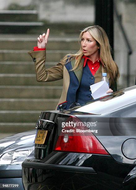 Heather Mills, estranged wife of former Beatle Paul McCartney, gestures outside the High Court in London, U.K., on Monday, March 17, 2008. Mills will...