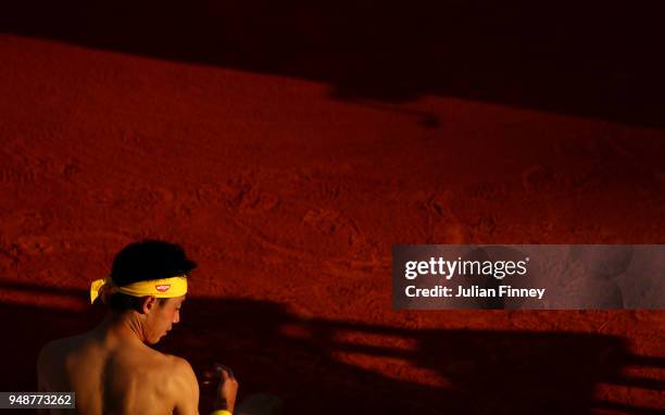 Kei Nishikori of Japan in action against Andreas Seppi of Italy during day five of the ATP Masters Series Monte Carlo Rolex Masters at Monte-Carlo...