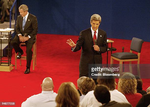 Democratic presidential nominee Senator John Kerry gestures as he answers a question from an undecided voter during the second Presidential Debate...