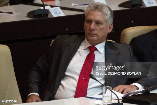 Cuba's new president Miguel Diaz-Canel, listens to the speech of Cuban former president Raul Castro after he was formally named president by the...
