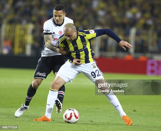 Adriano of Besiktas in action against Aatif Chahechouhe of Fenerbahce during Ziraat Turkish Cup Semi Final second leg soccer match between Fenerbahce...