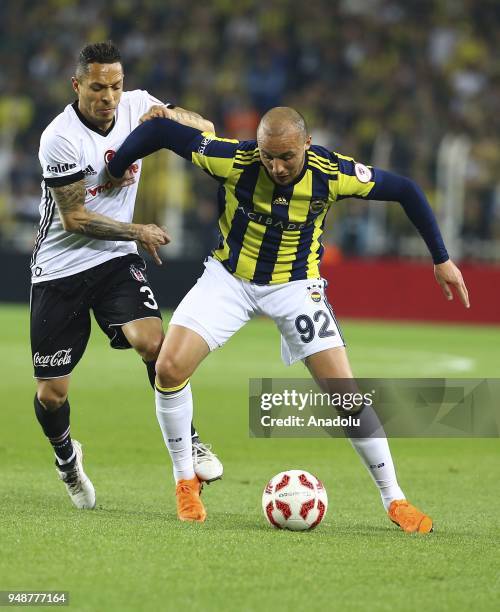 Adriano of Besiktas in action against Aatif Chahechouhe of Fenerbahce during Ziraat Turkish Cup Semi Final second leg soccer match between Fenerbahce...