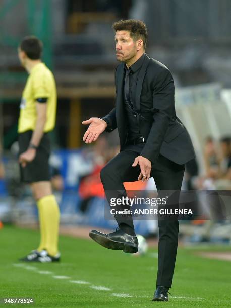 Atletico Madrid's Argentinian coach Diego Simeone gestures during the Spanish league football between Real Sociedad and Club Atletico de Madrid at...