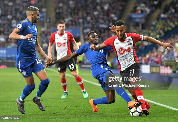 Ryan Bertrand of Southampton is tackled by Wilfred Ndidi of Leicester City during the Premier League match between Leicester City and Southampton at...