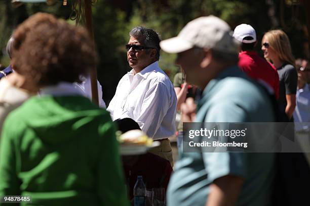 Henry "Hank" Vigil, vice-president of consumer strategy for Microsoft Corp., heads outside for lunch during the 26th annual Allen & Co. Media and...