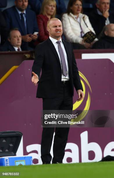 Sean Dyche, Manager of Burnley gives his team instructions during the Premier League match between Burnley and Chelsea at Turf Moor on April 19, 2018...