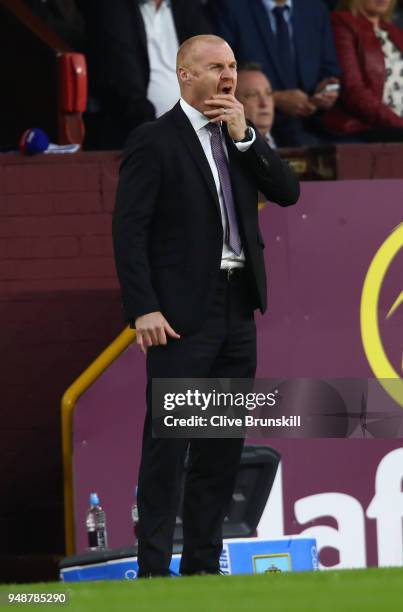 Sean Dyche, Manager of Burnley gives his team instructions during the Premier League match between Burnley and Chelsea at Turf Moor on April 19, 2018...