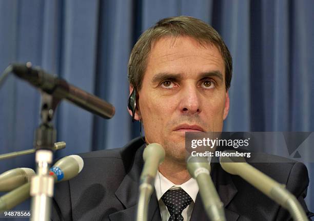 Mitsubishi Fuso Truck & Bus Corp. President Wilfried Porth listens to a question at a press conference in Tokyo Wednesday, October 6, 2004. Former...