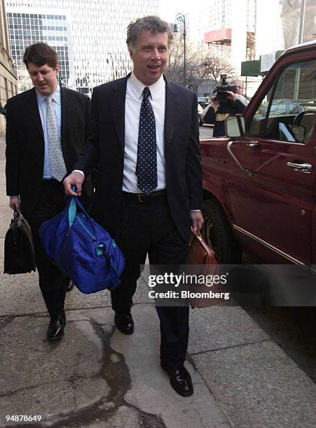 Reid Weingarten, right, attorney for former Worldcom CEO Bernard Ebbers, walks toward the federal courthouse after making a statement saying his...