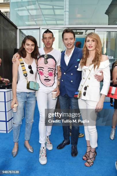 Guest, Karim Rashid,Carlo Colpo and Caterina Ghezzi attend Tiny Drinks on April 19, 2018 in Milan, Italy.