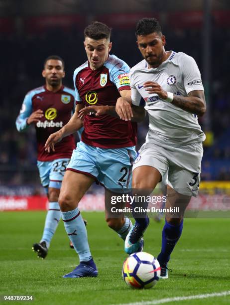 Emerson Palmieri of Chelsea is challenged by Matthew Lowton of Burnley during the Premier League match between Burnley and Chelsea at Turf Moor on...