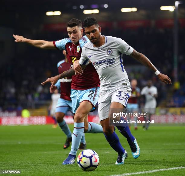 Emerson Palmieri of Chelsea is challenged by Matthew Lowton of Burnley during the Premier League match between Burnley and Chelsea at Turf Moor on...