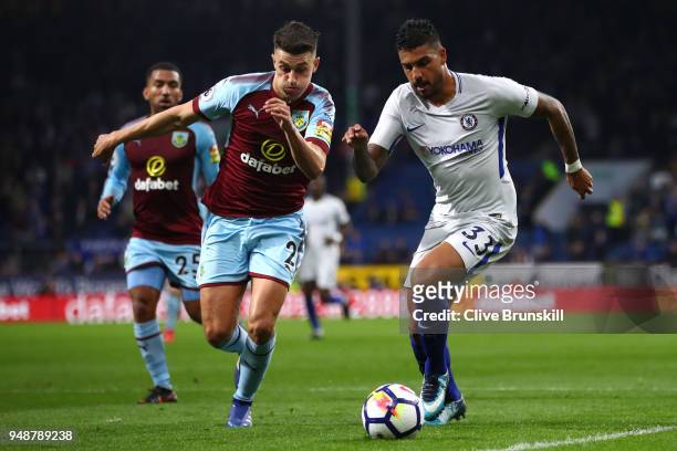 Emerson Palmieri of Chelsea is challenged by Matthew Lowton of Burnley during the Premier League match between Burnley and Chelsea at Turf Moor on...