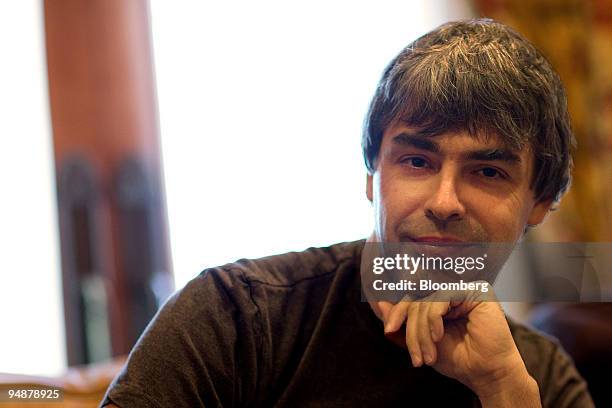 Larry Page, co-founder of Google Inc., smiles for a photograph while speaking with members of the media during the 26th annual Allen & Co. Media and...