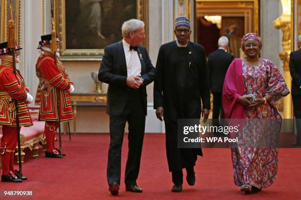 Nigeria's President Muhammadu Buhari arrives to attend The Queen's Dinner during The Commonwealth Heads of Government Meeting at Buckingham Palace on...