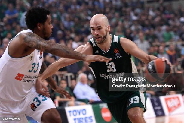 Nick Calathes, #33 of Panathinaikos Superfoods Athens competes with Trey Thompkins, #33 of Real Madrid during the Turkish Airlines Euroleague Play...