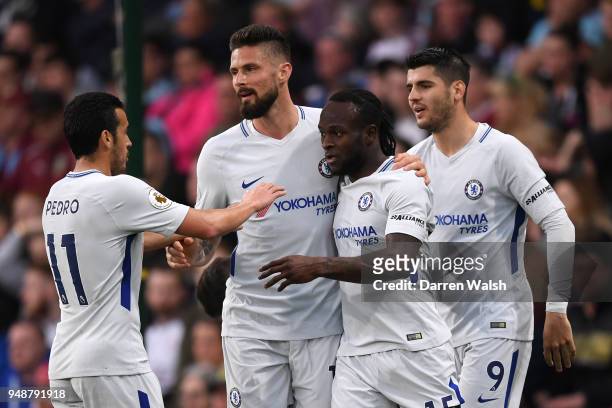Chelsea players celebrate their sides first goal, an own goal scored by Kevin Long of Burnley during the Premier League match between Burnley and...