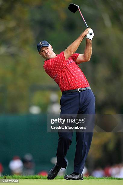 Stewart Cink of the U.S. Team tees off during a singles match against Graeme McDowell of the European team on day three of the 37th Ryder Cup at...