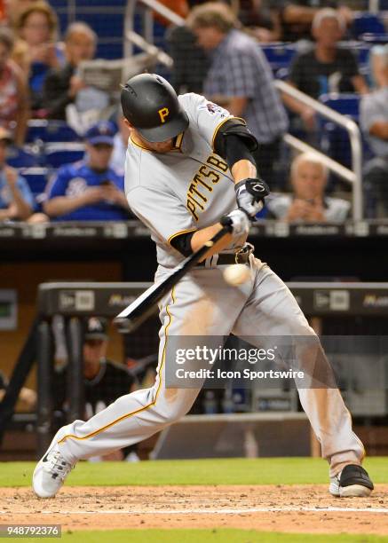 Pittsburgh Pirates third baseman David Freese hits the ball to the right field for and out during the the top of the fourth inning of the Major...