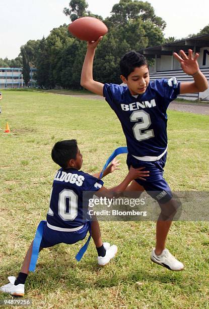 Joshua Olivo, right and Rogelio Fiscal train at Normal de Maestros school in Mexico City on Monday, September 26, 2005. Their team, the Bulldogs, is...