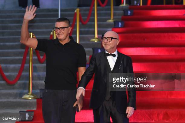 Fashion designers Stefano Gabbana and Domenico Dolce gesture prior the Dolce & Gabbana Alta Moda and Alta Sartoria collections fashion show at...