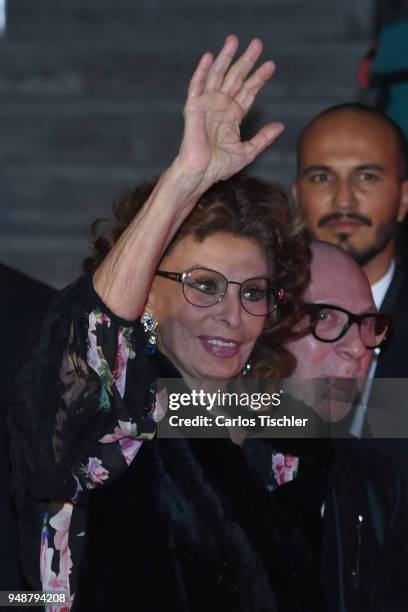 Actress Sofia Loren gestures prior the Dolce & Gabbana Alta Moda and Alta Sartoria collections fashion show at Soumaya Museum on April 18, 2018 in...
