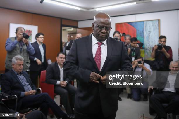 Joaquim Barbosa, former chief justice of Brazil's Supreme Federal Court, arrives for a meeting at the Brazilian Socialist Party headquarters in...