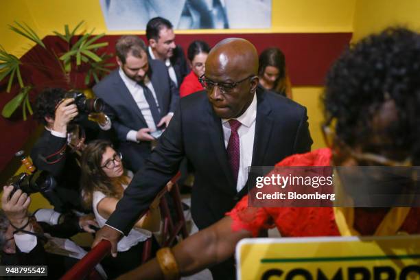 Joaquim Barbosa, former chief justice of Brazil's Supreme Federal Court, arrives for a meeting at the Brazilian Socialist Party headquarters in...