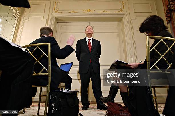 James Mulva, chief executive officer of ConocoPhillips, center, speaks during a news conference following an analyst meeting in New York, U.S., on...