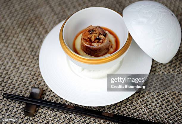 Sauteed fois gras with veal hearts is arranged for a photograph at the restaurant Aurum, in Tokyo, Japan, on Wednesday, July 10, 2008. Aurum is a...