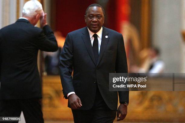 Kenya's President Uhuru Kenyatta arrives arrives to attend The Queen's Dinner during The Commonwealth Heads of Government Meeting at Buckingham...