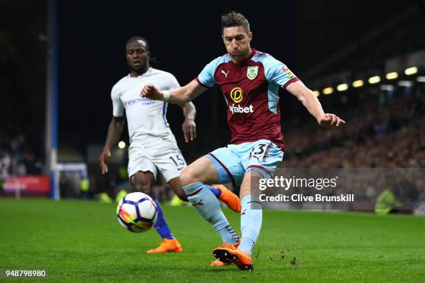Stephen Ward of Burnley crosses the ball during the Premier League match between Burnley and Chelsea at Turf Moor on April 19, 2018 in Burnley,...