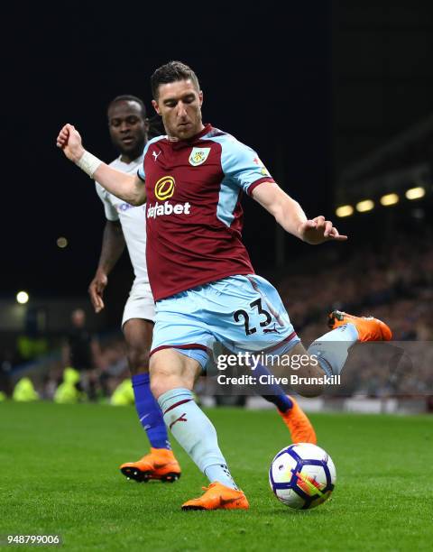 Stephen Ward of Burnley crosses the ball during the Premier League match between Burnley and Chelsea at Turf Moor on April 19, 2018 in Burnley,...