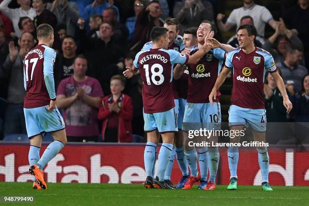 Ashley Barnes of Burnley celebrates with teammates after scoring his sides first goal during the Premier League match between Burnley and Chelsea at...