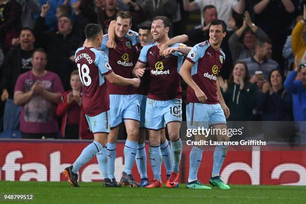 Ashley Barnes of Burnley celebrates with teammates after scoring his sides first goal during the Premier League match between Burnley and Chelsea at...