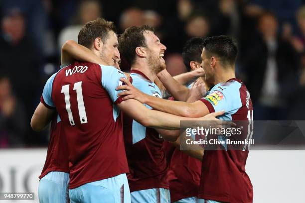 Ashley Barnes of Burnley celebrates with teammates after scoring his sides first goal during the Premier League match between Burnley and Chelsea at...