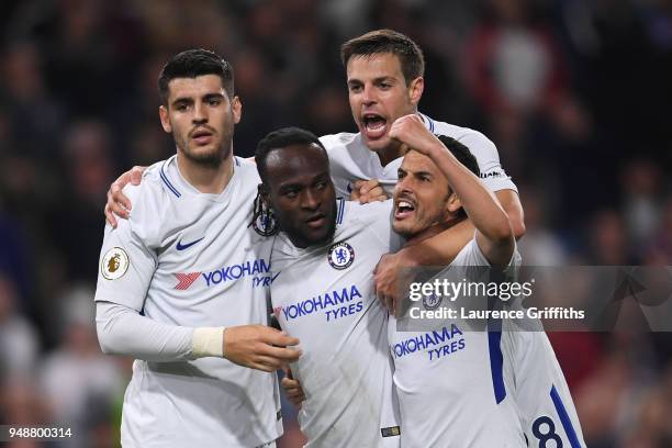 Victor Moses of Chelsea celebrates with teammates after scoring his sides second goal during the Premier League match between Burnley and Chelsea at...