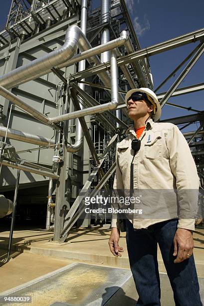 Steam technician Travis Turnstill monitors operations at Calpine Corp.'s power generation plant in Deer Park, Texas, on Thursday, February 26, 2004....