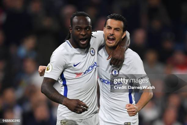 Victor Moses of Chelsea celebrates with teammate Pedro after scoring his sides second goal during the Premier League match between Burnley and...