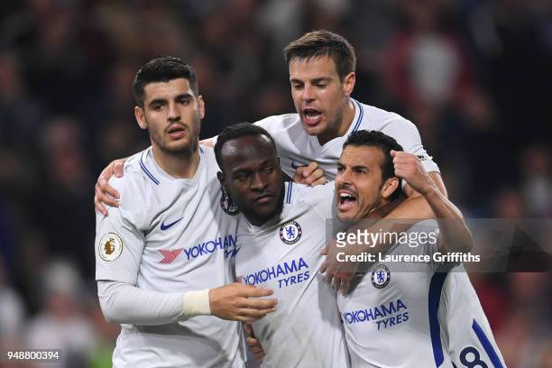 Victor Moses of Chelsea celebrates with teammates after scoring his sides second goal during the Premier League match between Burnley and Chelsea at...